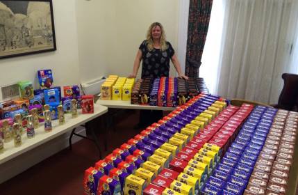 Medical secretary Sally Pemberton with a selection of the Easter eggs donated by staff