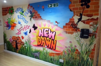 The new mural in the entrance hall to New Dawn Ward