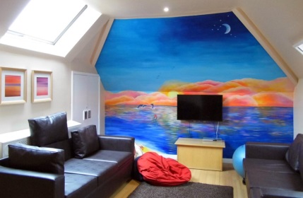 The mural in the New Dawn lounge area
