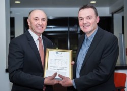 Nick Horne (right) receiving his award from the CPI's Martyn Dadds