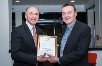 Nick Horne (right) receiving his award from the CPI's Martyn Dadds