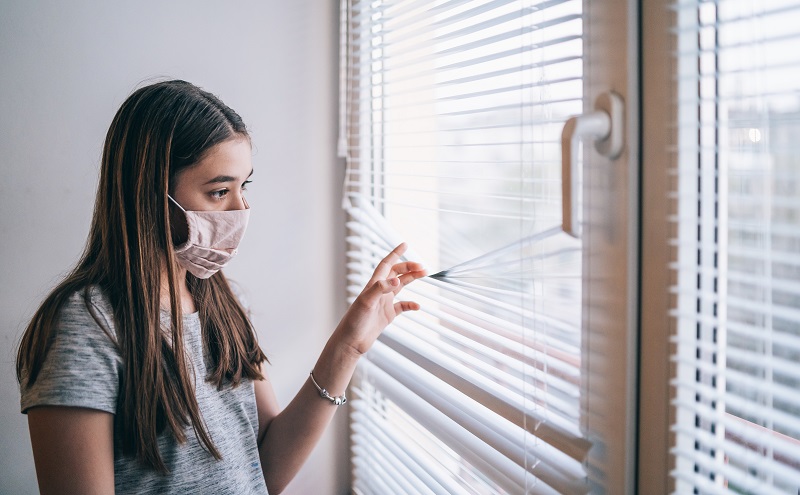 Girl in isolation at home during virus
