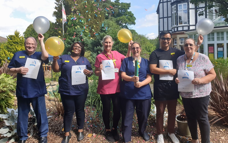 The team at Tupwood Gate Nursing Home celebrating their award