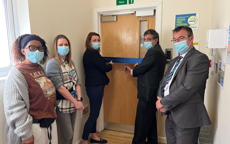 Cllr Saj Hussain, the Mayor of Woking cutting the ribbon with hospital manager, Carla Roadnight