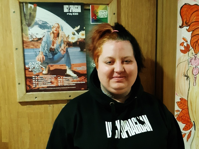 Tilly with her Lucy Spraggan poster and hoodie