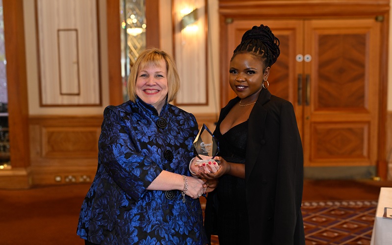 Cynthia Neta receiving her award for Nurse of the Year