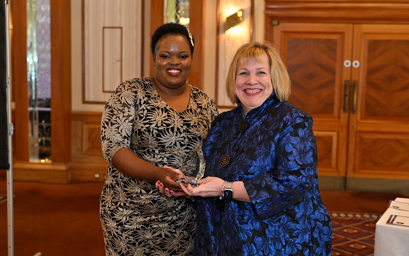 Junior Sibanda receiving her Diversity and Inclusion Award