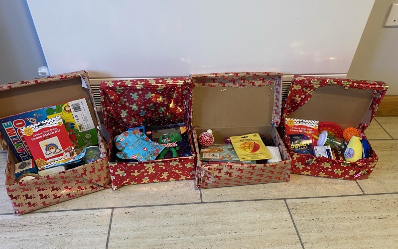 The shoeboxes filled with donated gifts