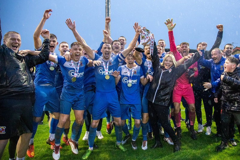 The Mold Alex FC team celebrating their win