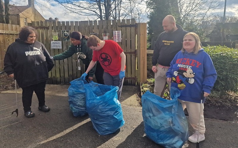 Residents and staff from Langdale House litterpicking