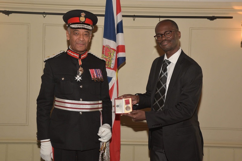 Matthew McKenzie receiving his British Empire Medal