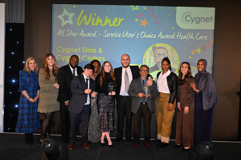 cedars and elms accepting their award