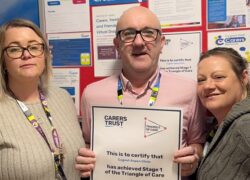 Neil Boot, Hospital Manager, with the Triangle of Care certificate