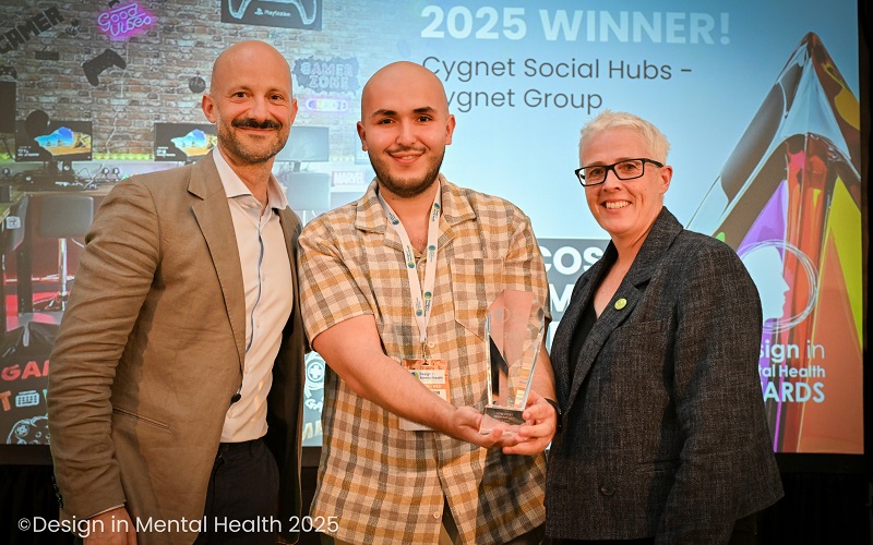 Raf being presented with the Low Cost - High Impact award at the Design in Mental Health Awards