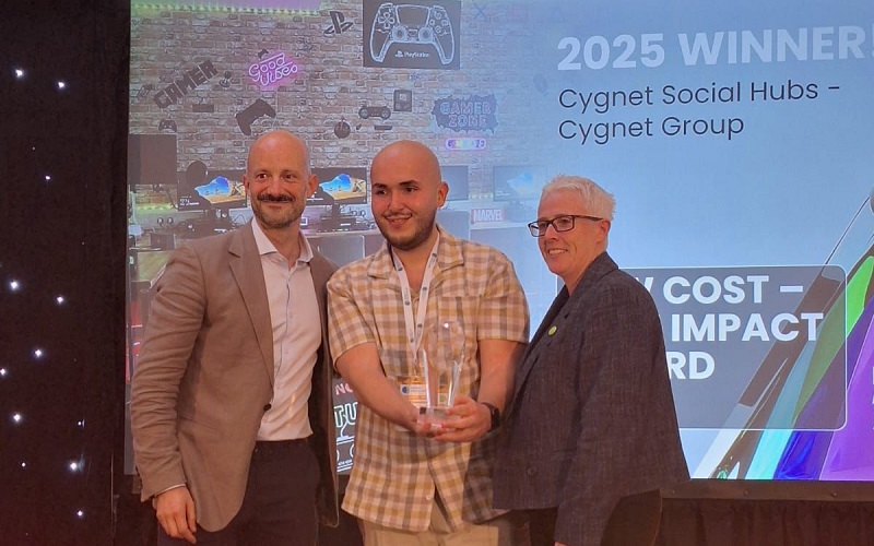 Raf being presented with the Low Cost - High Impact award at the Design in Mental Health Awards
