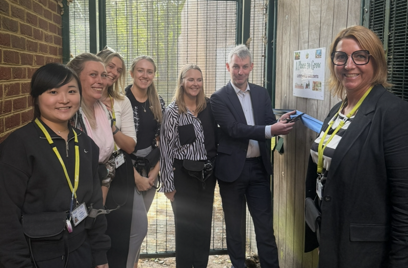 MP Will Forster opening Cygnet Hospital Woking's new allotment