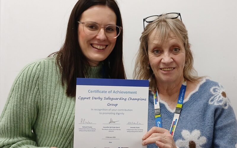 Cygnet Hospital Derby's Carol Collins and Emily Rowlandson-Gray and the Dignity Achievement certificate
