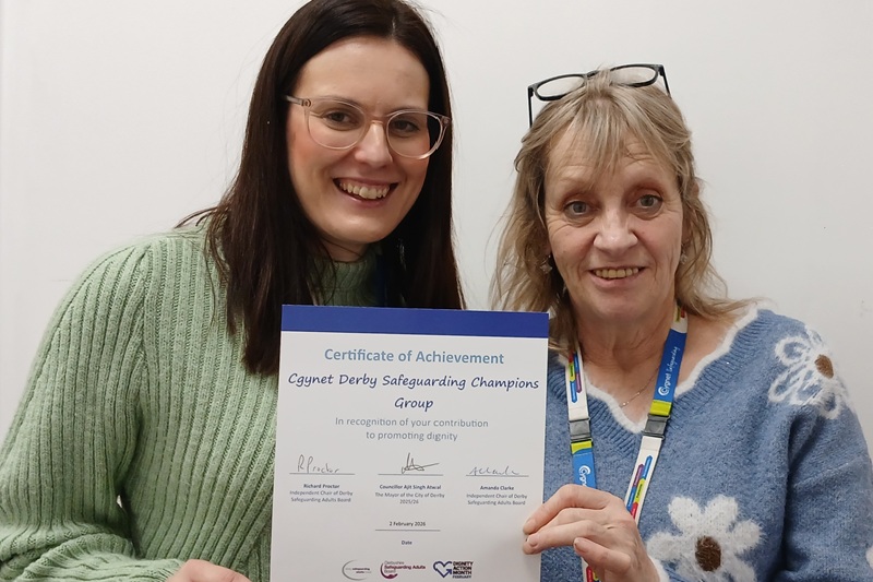 Cygnet Hospital Derby's Carol Collins and Emily Rowlandson-Gray and the Dignity Achievement certificate