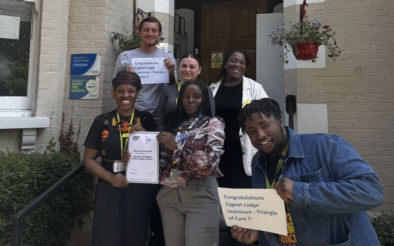 The team at Cygnet Lodge Lewisham celebrating their Triangle of Care accreditation