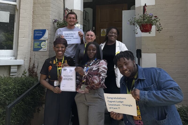 The team at Cygnet Lodge Lewisham celebrating their Triangle of Care accreditation