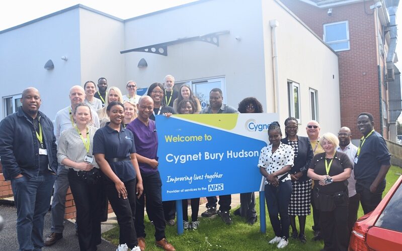 Members of the Cygnet Bury Hudson team gathered together outside the hospital