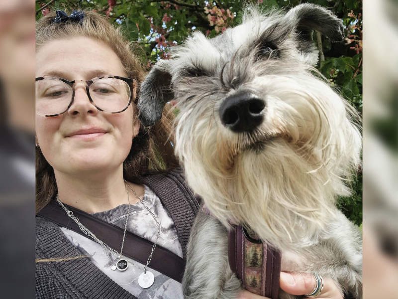 The patient Emily and her assistance dog Ella