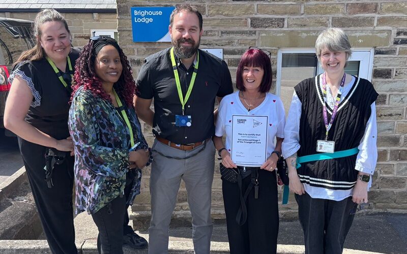 Team members at Cygnet Lodge Brighouse with their Triangle of Care certificate