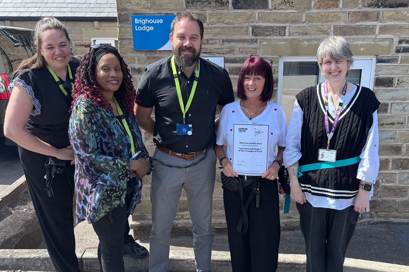 Team members at Cygnet Lodge Brighouse with their Triangle of Care certificate