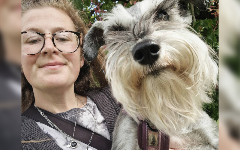 The patient Emily and her assistance dog Ella